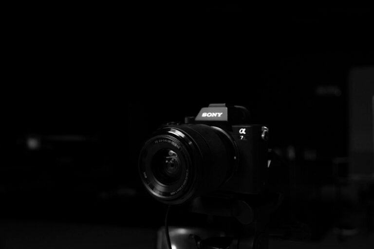 Grayscale image of a camera lens capturing timeless elegance and sophistication.